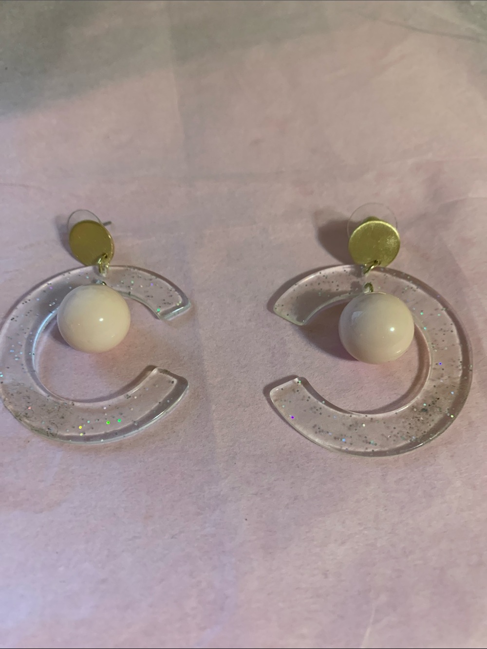 Clear Glitter C-Shaped Drop Earrings with Cream Bead and Gold Accent